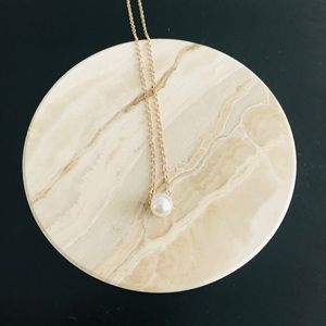 Gold tone faux pearl necklace